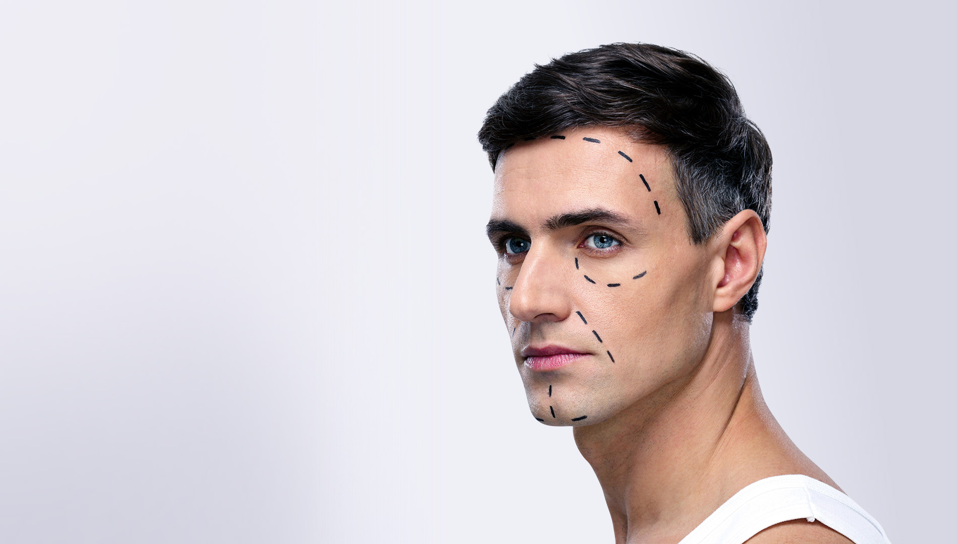 man with facial markings