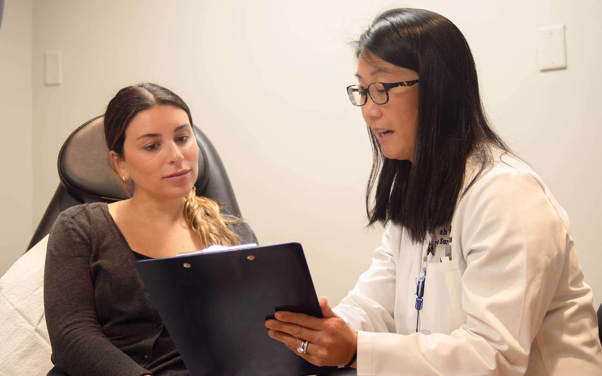 physician explaining chart to patient