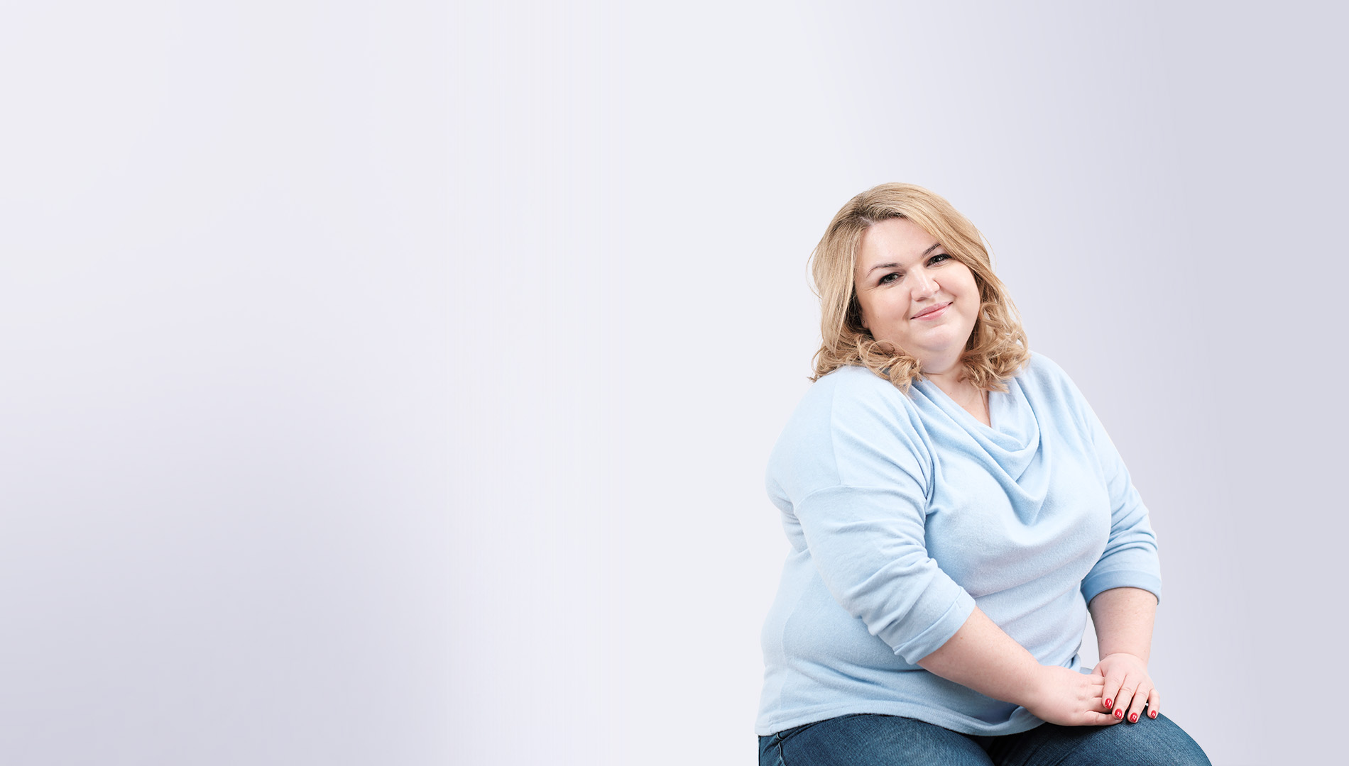 Young obese woman in casual blue clothes