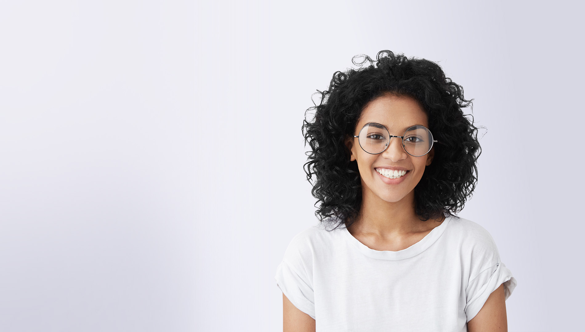 beautiful brunette young dark-skinned woman smiling cheerfully