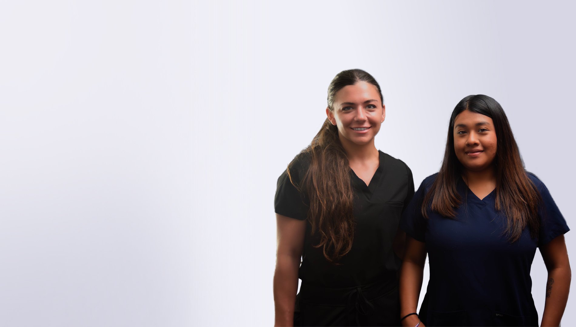 two-female-physician-assistants-smiling