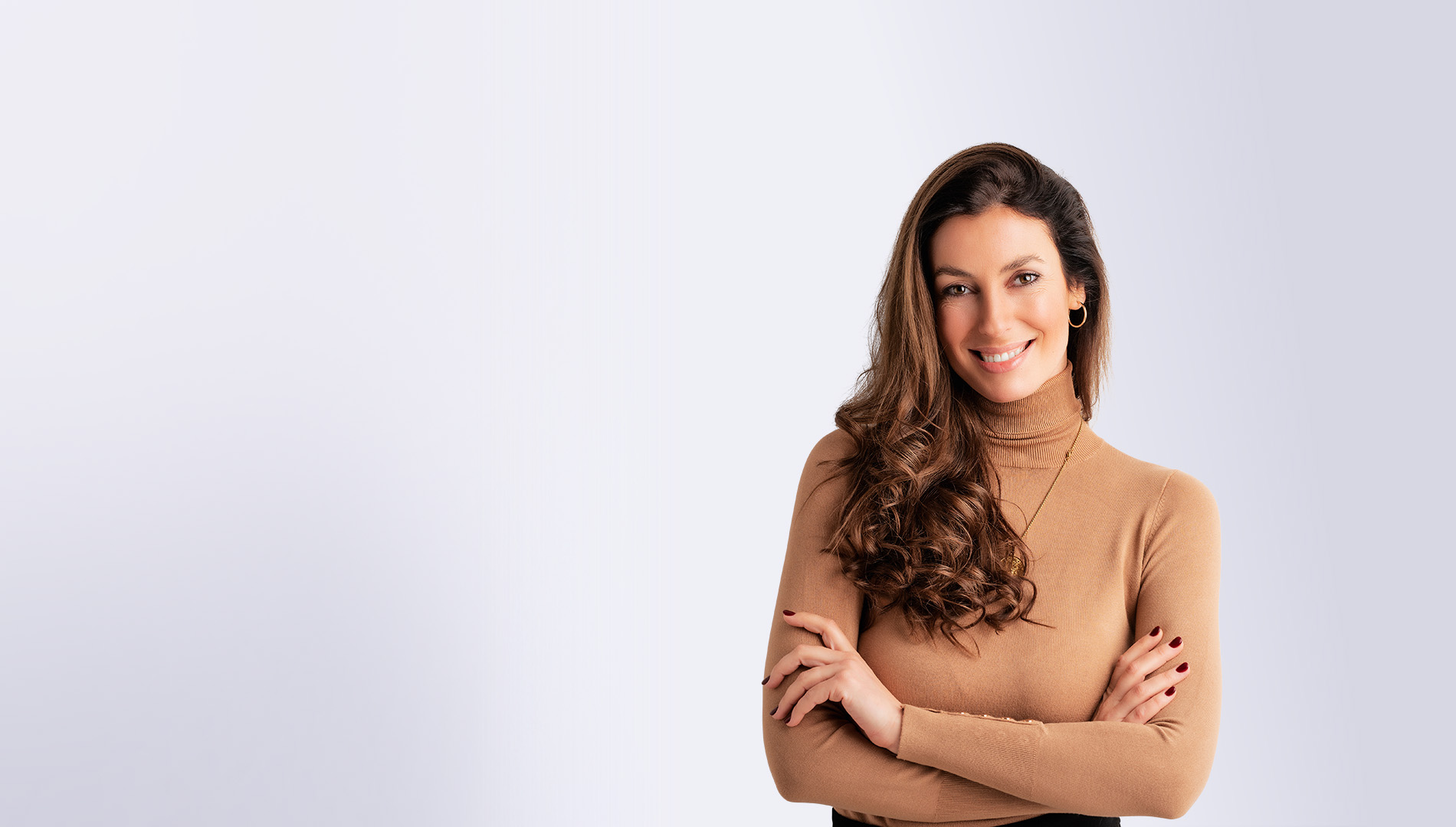 Atttractive middle aged woman looking at camera